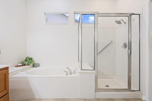 101 Goldenrod Way, Georgetown, TX 78633 - full bathroom featuring vanity, a shower stall, and a bath