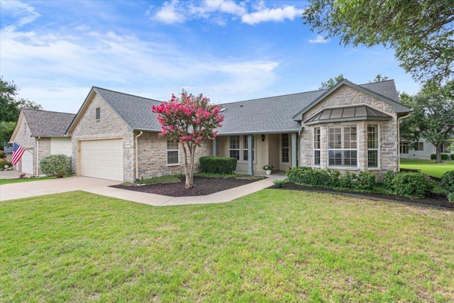 101 Goldenrod Way, Georgetown, TX 78633 - ranch-style home featuring stone siding, a garage, driveway, a front lawn, and roof with shingles