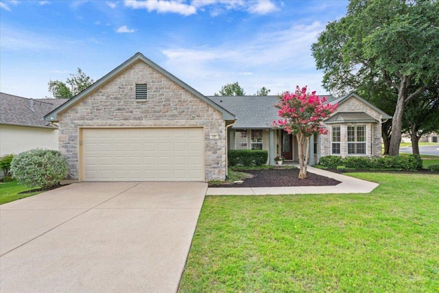 101 Goldenrod Way, Georgetown, TX 78633 - single story home with a garage, stone siding, driveway, and a front lawn