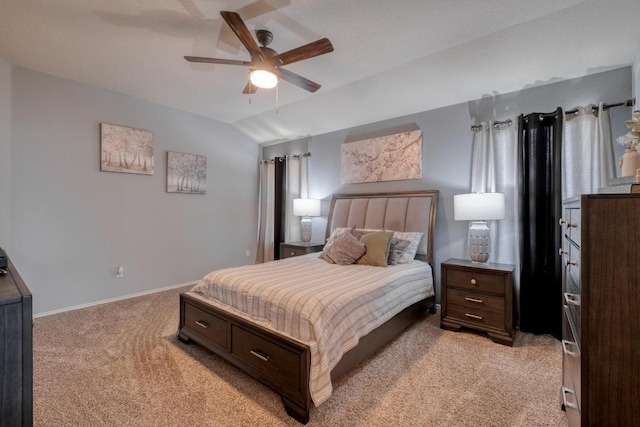 125 Lillian Dr, Taylor, TX 76574 - bedroom featuring light colored carpet, lofted ceiling, and a ceiling fan