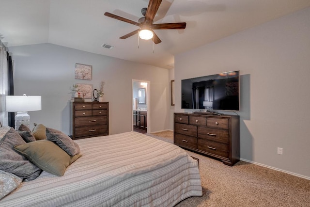 125 Lillian Dr, Taylor, TX 76574 - bedroom with light colored carpet, vaulted ceiling, a ceiling fan, and ensuite bath