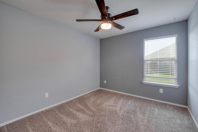 125 Lillian Dr, Taylor, TX 76574 - carpeted empty room featuring ceiling fan and baseboards