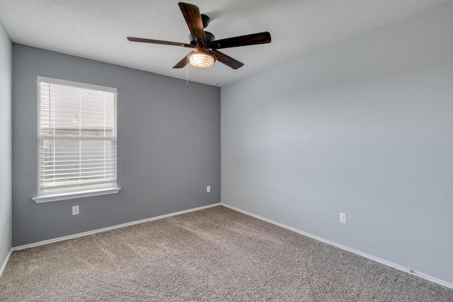 125 Lillian Dr, Taylor, TX 76574 - spare room with a ceiling fan and carpet
