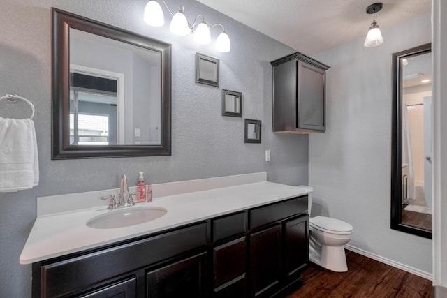 125 Lillian Dr, Taylor, TX 76574 - full bath featuring vanity and wood finished floors