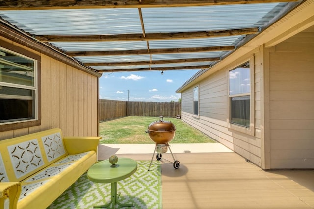 125 Lillian Dr, Taylor, TX 76574 - fenced backyard featuring a patio area and outdoor lounge area
