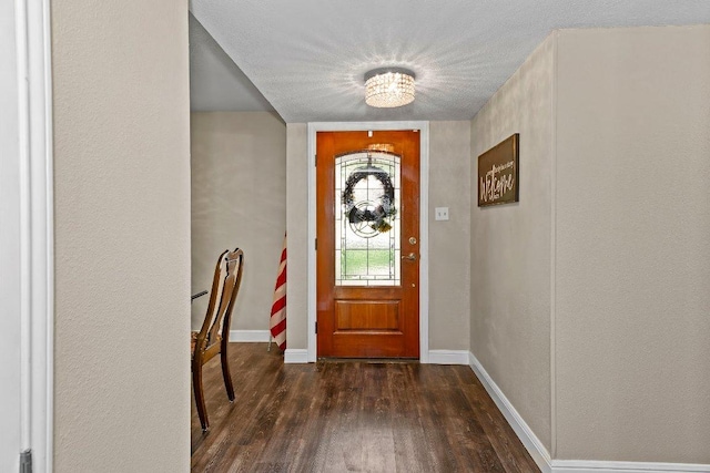 12403 Cassady Dr, Austin, TX 78727 - entrance foyer featuring wood finished floors and a chandelier