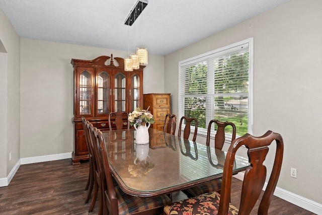12403 Cassady Dr, Austin, TX 78727 - dining room featuring dark wood-type flooring and a chandelier
