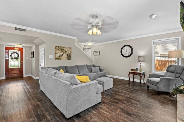 12403 Cassady Dr, Austin, TX 78727 - living room featuring dark wood-style flooring, a ceiling fan, crown molding, stairway, and arched walkways