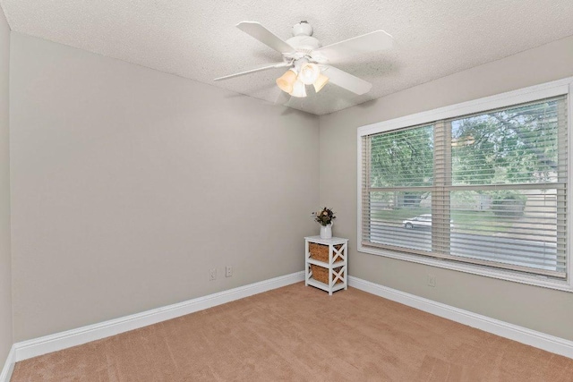 12403 Cassady Dr, Austin, TX 78727 - carpeted spare room featuring a textured ceiling and a ceiling fan