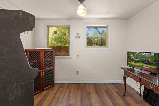 12403 Cassady Dr, Austin, TX 78727 - living area with baseboards and wood finished floors