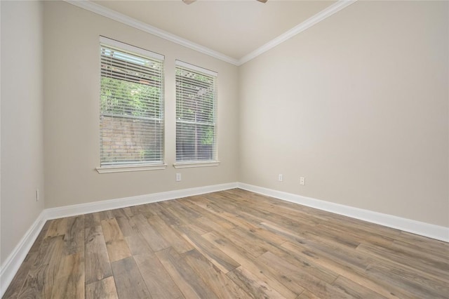 21 Green Terrace Cv, Lakeway, TX 78734 - unfurnished room featuring wood finished floors, ornamental molding, and a ceiling fan