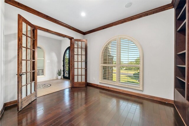 107 Bella Strada Cv, Lakeway, TX 78734 - empty room with french doors, arched walkways, wood finished floors, crown molding, and recessed lighting