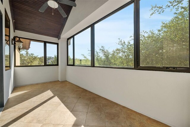 107 Bella Strada Cv, Lakeway, TX 78734 - unfurnished sunroom with lofted ceiling and tile patterned flooring