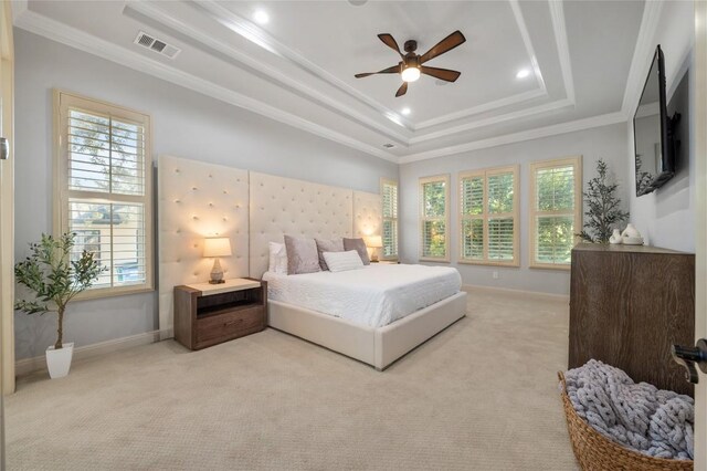 107 Bella Strada Cv, Lakeway, TX 78734 - bedroom with a raised ceiling, multiple windows, carpet flooring, crown molding, and ceiling fan