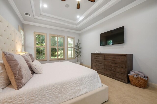 107 Bella Strada Cv, Lakeway, TX 78734 - carpeted bedroom featuring a raised ceiling, crown molding, and ceiling fan