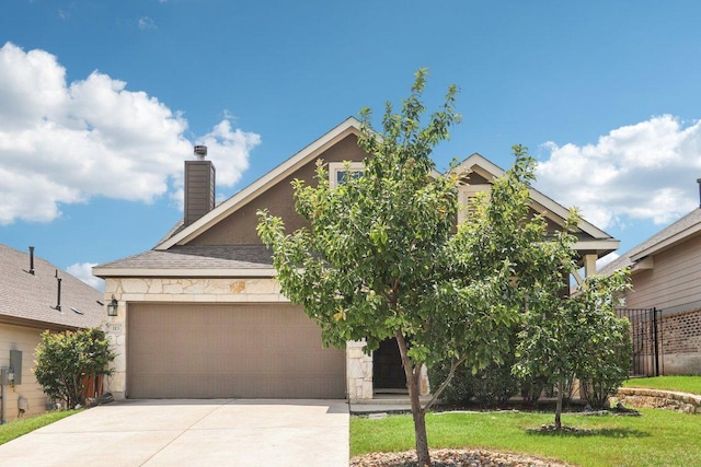 113 Berkeley Pl, Georgetown, TX 78628 - obstructed view of property featuring a chimney, driveway, an attached garage, and stone siding