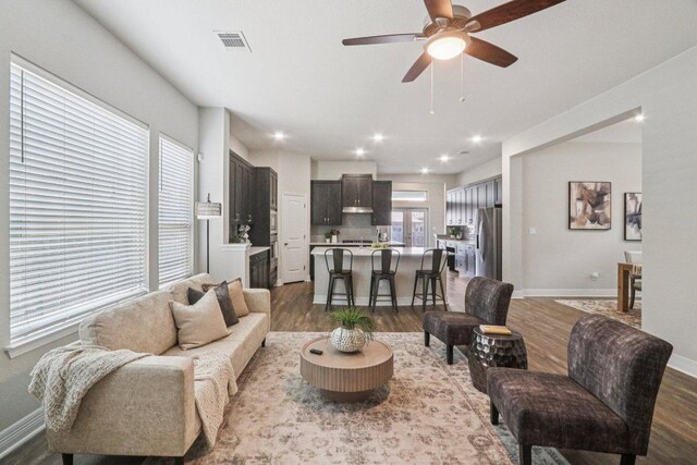 113 Berkeley Pl, Georgetown, TX 78628 - living room with dark wood-type flooring, a ceiling fan, and recessed lighting