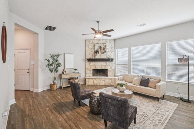 113 Berkeley Pl, Georgetown, TX 78628 - living room featuring ceiling fan, wood finished floors, and a stone fireplace