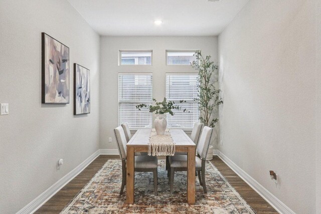 113 Berkeley Pl, Georgetown, TX 78628 - dining area with dark wood-type flooring and baseboards