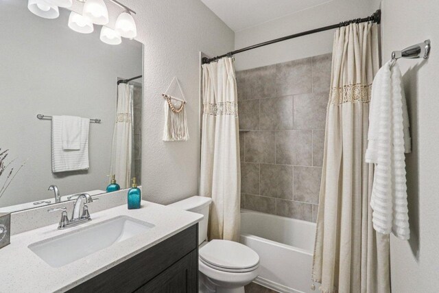 113 Berkeley Pl, Georgetown, TX 78628 - full bath with vanity, shower / bath combo, and a textured wall