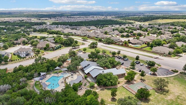 113 Berkeley Pl, Georgetown, TX 78628 - aerial perspective of suburban area with a pool area