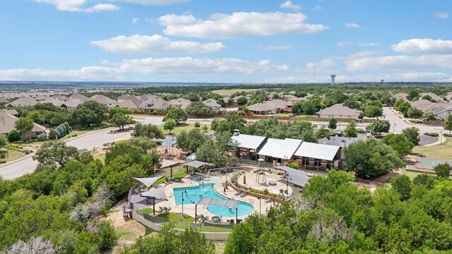 113 Berkeley Pl, Georgetown, TX 78628 - aerial perspective of suburban area with a pool