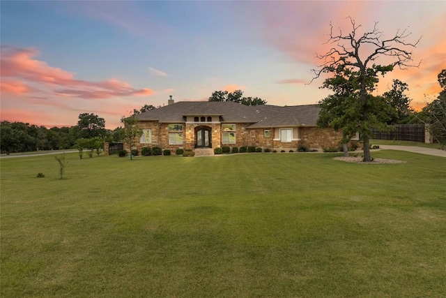 106 Packsaddle Dr, Bastrop, TX 78602 - view of front of home featuring a front yard and french doors