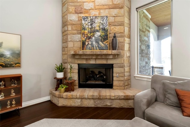 106 Packsaddle Dr, Bastrop, TX 78602 - living room with wood finished floors and a brick fireplace