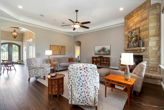 106 Packsaddle Dr, Bastrop, TX 78602 - living area with arched walkways, wood-type flooring, french doors, ceiling fan, and ornamental molding