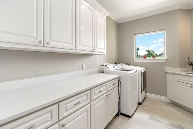 106 Packsaddle Dr, Bastrop, TX 78602 - laundry room featuring cabinet space, washer and dryer, and crown molding