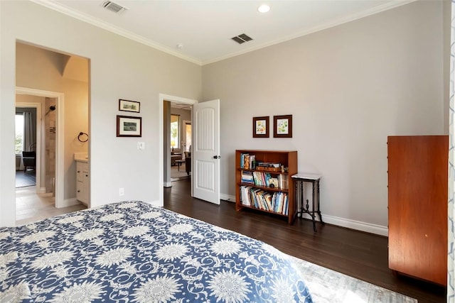 106 Packsaddle Dr, Bastrop, TX 78602 - bedroom with multiple windows, crown molding, and wood finished floors