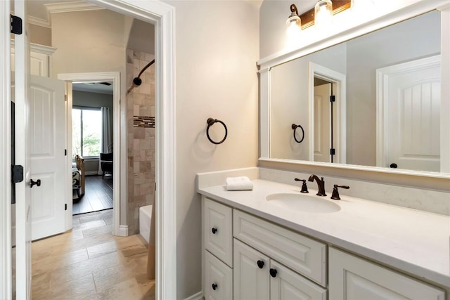 106 Packsaddle Dr, Bastrop, TX 78602 - bathroom featuring vanity, washtub / shower combination, ornamental molding, and tile patterned floors
