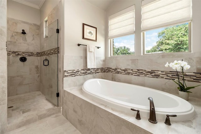 106 Packsaddle Dr, Bastrop, TX 78602 - bathroom with a bath, a stall shower, and crown molding