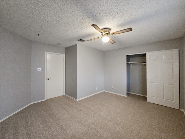 1318 Chalk Ln, Cedar Park, TX 78613 - unfurnished bedroom with carpet, a closet, a textured ceiling, and ceiling fan