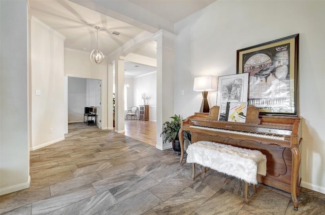 4304 Lost Oasis Holw, Austin, TX 78739 - hallway with decorative columns, crown molding, and a chandelier