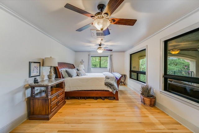 14305 Geronimo St, Leander, TX 78641 - bedroom featuring ornamental molding, light wood-style flooring, and a ceiling fan