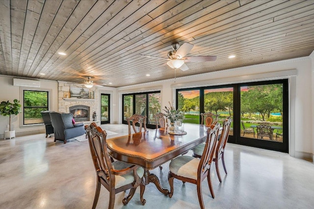 14305 Geronimo St, Leander, TX 78641 - dining area featuring wood ceiling, finished concrete flooring, healthy amount of natural light, and recessed lighting