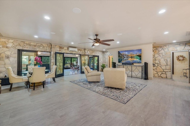 14305 Geronimo St, Leander, TX 78641 - living area with ornamental molding, ceiling fan, recessed lighting, and a wall mounted AC