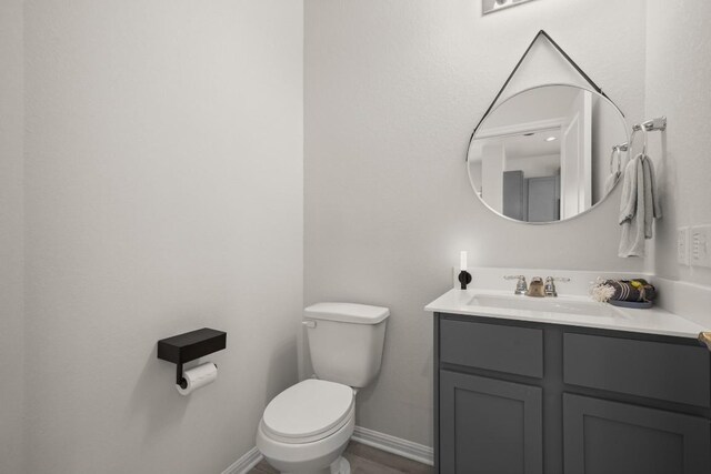 17202 Adoro Dr, Manor, TX 78653 - half bathroom with vanity and toilet
