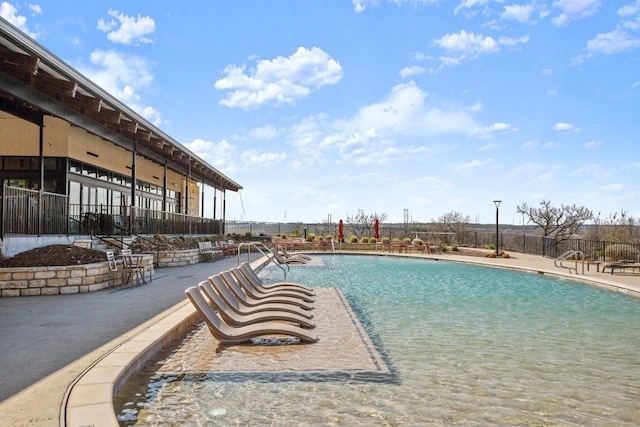 17202 Adoro Dr, Manor, TX 78653 - community pool with a patio area