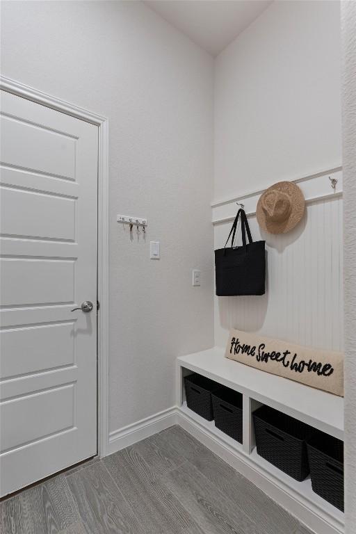 624 Judge Fisk Dr, Leander, TX 78641 - mudroom with wood finished floors and baseboards