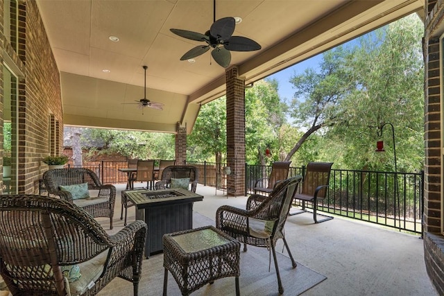 624 Judge Fisk Dr, Leander, TX 78641 - view of patio featuring a ceiling fan and an outdoor living space with a fire pit