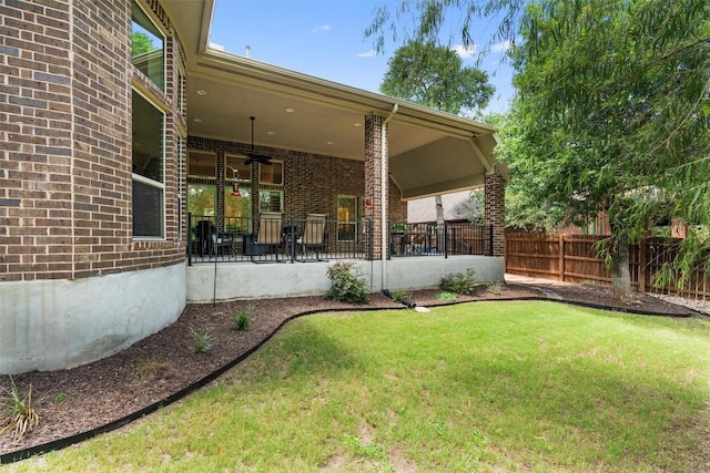 624 Judge Fisk Dr, Leander, TX 78641 - fenced backyard with a ceiling fan