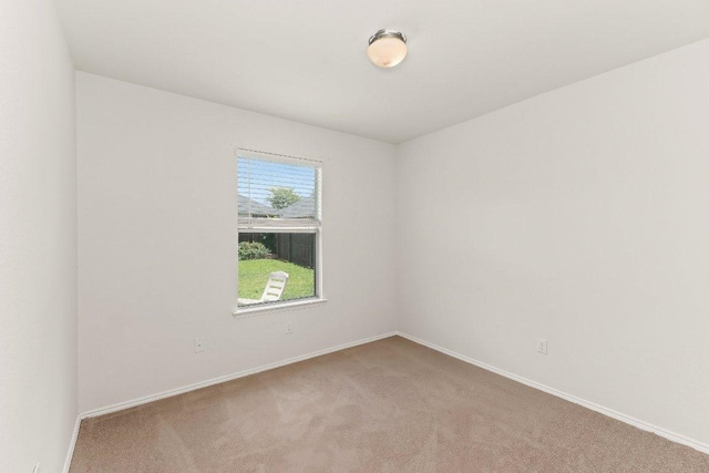 324 Kingfisher Ln, Leander, TX 78641 - spare room with carpet flooring and baseboards