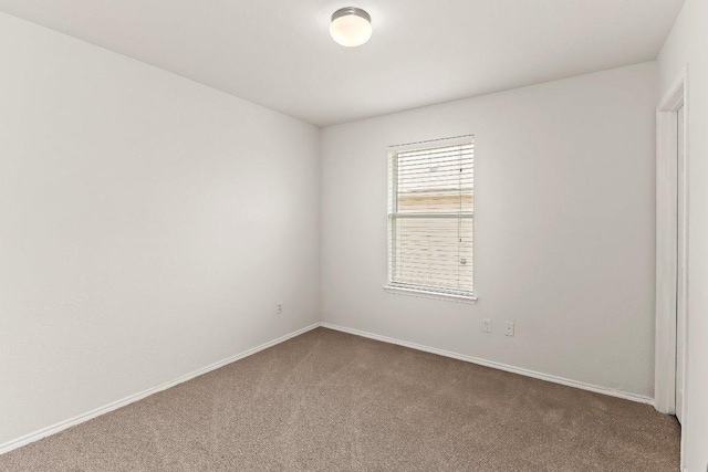 324 Kingfisher Ln, Leander, TX 78641 - spare room with carpet flooring and baseboards
