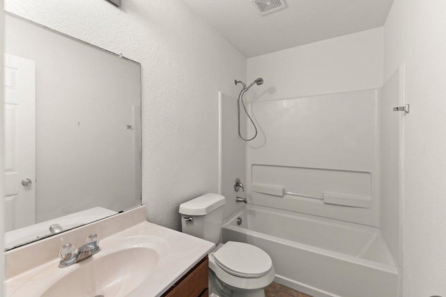 324 Kingfisher Ln, Leander, TX 78641 - full bathroom with shower / bath combination, vanity, and a textured wall