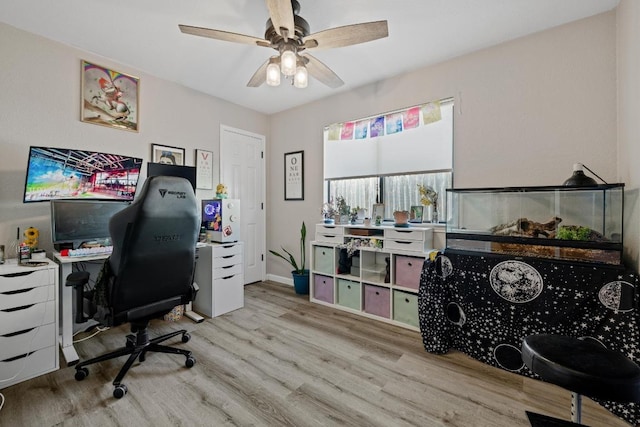 1821 Golden Pheasant Dr, Austin, TX 78758 - office area with wood finished floors and ceiling fan