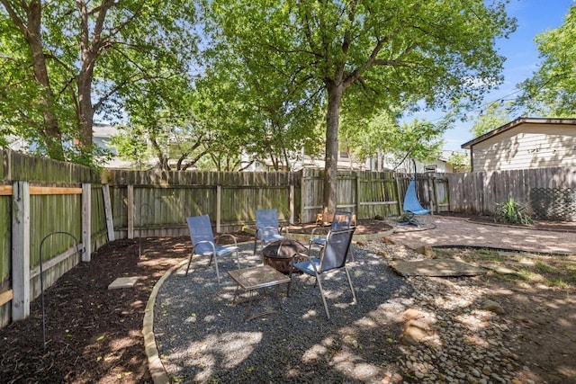 1821 Golden Pheasant Dr, Austin, TX 78758 - fenced backyard with a fire pit
