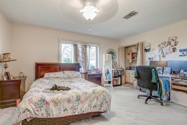 1402 Herder Ave, Schulenburg, TX 78956 - bedroom with light marble finish flooring and ceiling fan