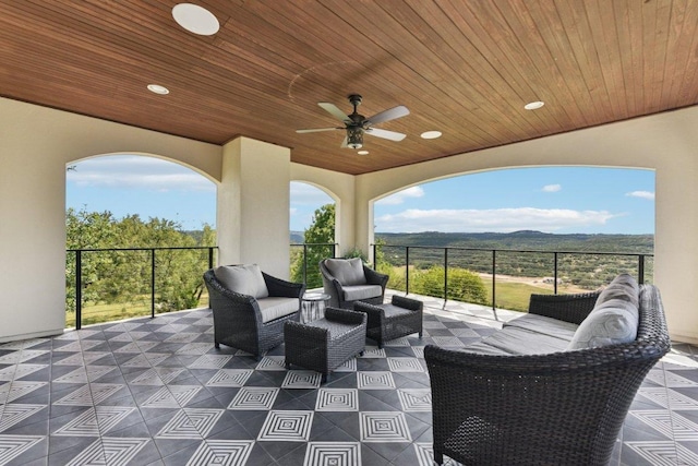 1108 Lakewood Hills Ter, Austin, TX 78732 - view of patio / terrace with outdoor lounge area, ceiling fan, and a mountain view